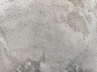 Rough gray concrete wall background with aged textured surface