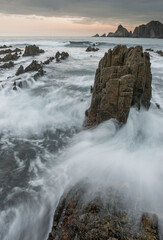 Spectacular landscape in the Cantabrian Sea with waves breaking against the rocks