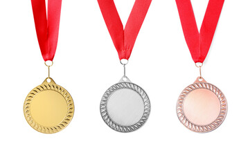 Gold, silver and bronze medals isolated on white