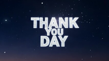 A large screen with the words "Thank You Day" written in gold letters. The letters are surrounded by stars and appear to be glowing