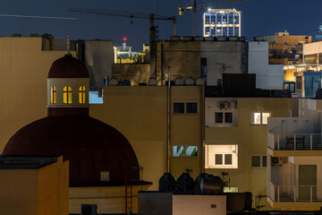 Valletta, Malta Residential buildings in the Sielma district and the dome of the Parish Church of...