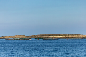St Paul's, Malta Aqualculture nets in the Mediterranean Sea