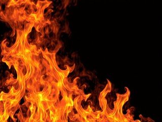 Realistic fiery flames in vibrant orange and yellow hues on a dark black background, burning