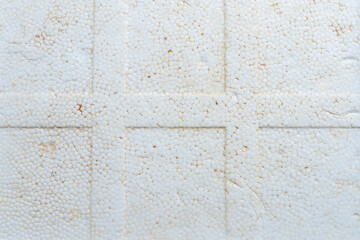 White textured wall with rough brickwork, perfect for vintage or industrial design backgrounds