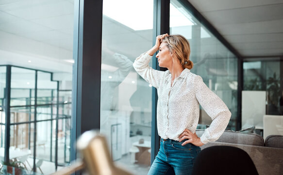 Thinking, stress and mature woman in office with worry for crisis, company risk and mistake. Business manager, corporate and person with financial decision for bankruptcy, failure and unemployment