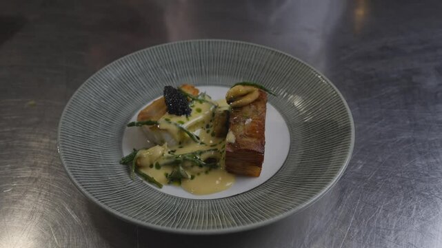 Top view of ready cod dish in a kitchen 