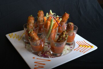 A generous portion of biryani, complete with garnishes and a vibrant presentation.