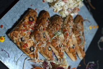 A generous portion of biryani, complete with garnishes and a vibrant presentation.