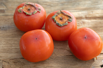 Fresh orange persimmon isolated on white background