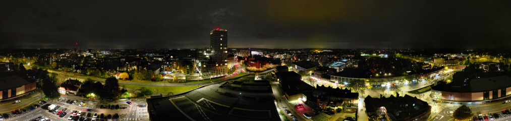 High Angle Panoramic View of Illuminated North Watford City Which is Located in North London During Cold and Cloudy Night of November 14th, 2024. Drone's Camera Footage.