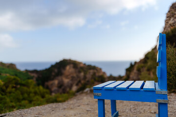 A vibrant blue chair captures the essence of coastal serenity