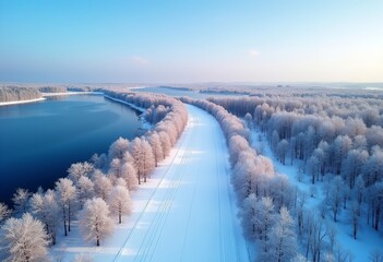 Breathtaking Aerial Shot of a Winter Wonderland: Snow-Covered Trees Alongside a Serene Lake
