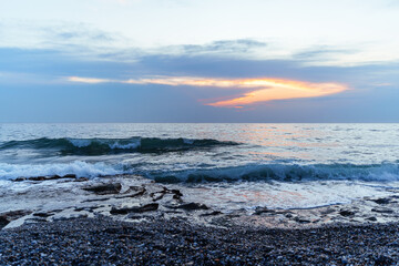 Tranquil Ocean Sunset With Vibrant Skies and Gentle Waves..