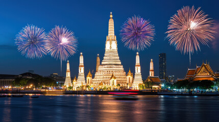 Fototapeta premium Colorful fireworks illuminate night sky over Chao Phraya River, showcasing stunning Wat Arun temple in Bangkok. vibrant celebration of light and culture