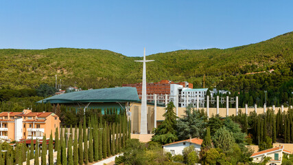 Aerial view of the monumental cross at the entrance to the Sanctuary of Saint Pio of Pietrelcina. It is a Catholic shrine in San Giovanni Rotondo, in the province of Foggia, in Puglia, Italy.