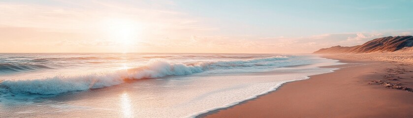 Serene beach landscape at sunset with gentle waves and soft colors.