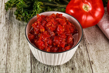 Diced ripe tomato with sauce