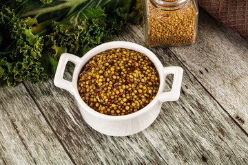 Mustard sauce with seeds in the bowl