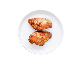 Cooked grilled chicken breast on a white plate with a translucent background.