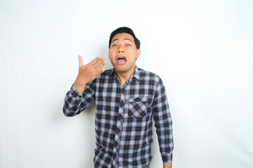 allergic asian man sneezing suffering flu and virus diseas isolated on white wearing casual shirt