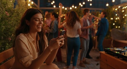 Joyful evening gathering with friends and music under festive lights in an outdoor setting