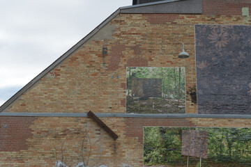 Naklejka premium installation work and label on the side of a historic Evergreen Brick Works structure in Toronto, Canada