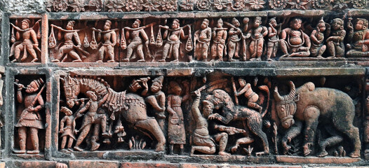 Old style terracotta art portraying hindu mythological stories on Kantajew temple  of Bangladesh. Kantanagar temple commonly known as Kantaje Temple,dinajpur,Bangladesh is a late-medieval Hindu temple