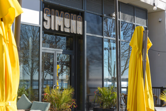 patio entrance of SIMONA, an Italian Restaurant, located at 59 Merchants' Wharf (near Sherbourne Common) in downtown Toronto, Canada