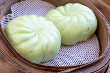 Asian food, steamed cooked filled gyoza dumplings in street cafe ready to eat
