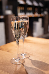 Tasting sparkling white wine, traditional champagne method making of cremant in caves on Moselle river valley in Luxembourg, wine tour and visiting caves
