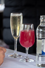 Autumn wine festival in Schengen, Luxembourg on Moselle river valley, tasting of federweisser young wine, neuer wein fermented freshly pessed auxerrois grape juice, or must.