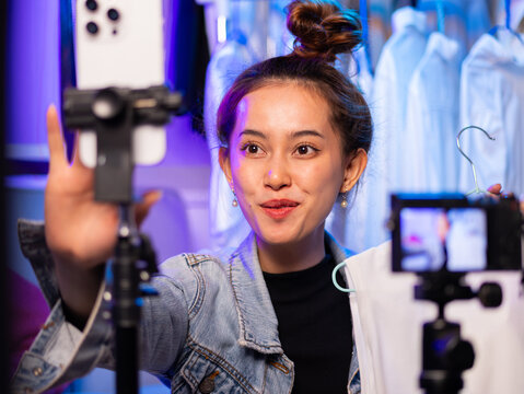 Live streaming session fashion studio video content urban environment engaging viewpoint digital interaction