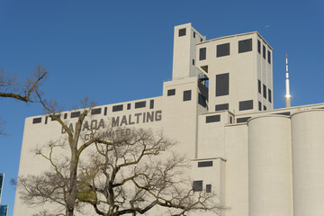 Fototapeta premium exterior of Canada Malting Co located at 9 Eireann Quay in the Bathurst Quay Common area downtown west Toronto, ON