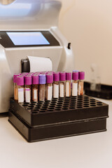 Blood sample tubes in a laboratory analyzer for testing and diagnostics
