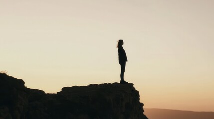 Empowering women standing strong on a cliff at dawn nature landscape personal growth gender equality perspective