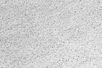 Fototapeta premium A sheet of gray spotted recycled craft paper texture as background