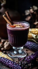 Chicha morada drink displayed in a traditional glass, showcasing deep purple color and spices