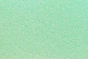 Fine light green sponge texture or background, pink sponge pattern