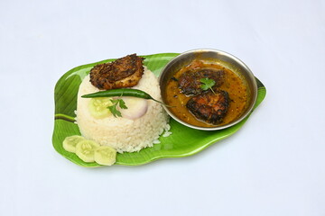 Delicious Indian fish curry with rice. Traditional Asian fish curry dish. Asian food and meal. It is liked all over India. Indian style fish curry served in plate with rice. Indian food. 