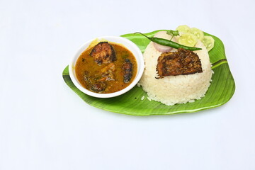 Delicious Indian fish curry with rice. Traditional Asian fish curry dish. Asian food and meal. It is liked all over India. Indian style fish curry served in plate with rice. Indian food. 