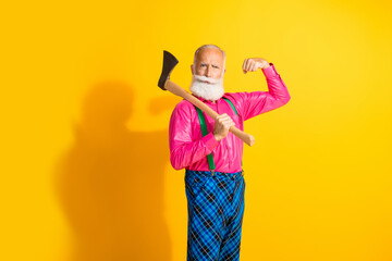 Photo of old gentleman hold axe maniac flexing muscles dressed glamour stylish outfit party isolated vibrant yellow color background