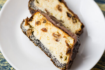 Delicious chocolate dessert, cheesecake with raisins and poppy seeds. Lviv cheesecake, a traditional Ukrainian dessert