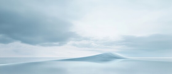 Softly undulating snow dunes meet a vast, serene sky, painting a landscape of pristine peace and endless horizons.
