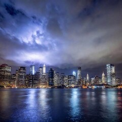 Fototapeta premium A high-resolution ultrarealistic image of city skyline at night, captured in digital photography. The focal point is the brightly illuminated skyscrapers with countless sparkling windows reflecting on