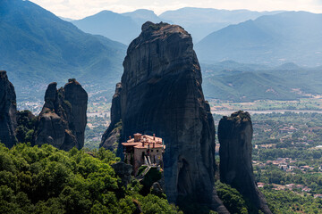 Town of Kalabaka with monasteries on meteora rocks. This is in Greece. The monasteries are public...