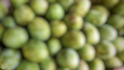 Blur pile of green mango fruit