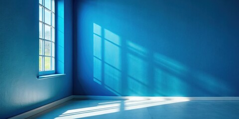Obraz premium Sunlight casting shadows in room corner with blue wall creating dramatic effect