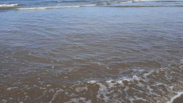 Calm Ocean Waves at Pariaman Beach, Indonesia