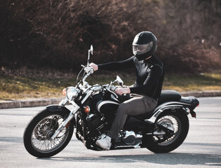 Fototapeta premium A man riding a motorcycle