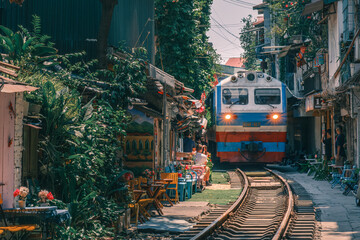 Colorful tram on narrow city street